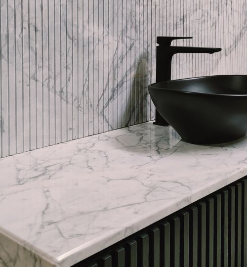 Lavori Rivestimento bagno e top in marmo Carrara